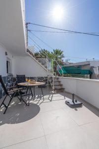 A balcony or terrace at Spectacular Cave with two large terraces (70m2) by the sea