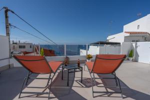 A balcony or terrace at Spectacular Cave with two large terraces (70m2) by the sea