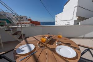 A balcony or terrace at Spectacular Cave with two large terraces (70m2) by the sea
