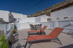 A balcony or terrace at Spectacular Cave with two large terraces (70m2) by the sea