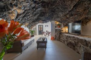 A seating area at Spectacular Cave with two large terraces (70m2) by the sea