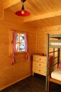 Postel nebo postele na pokoji v ubytování Pilger-Hüttli - Blockhaus