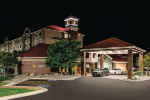 a large building with a clock tower on top of it at La Quinta by Wyndham Grand Junction Airport in Grand Junction