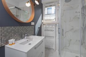 Koupelna v ubytování Sunny Apartment Łukęcin by Noclegi Renters