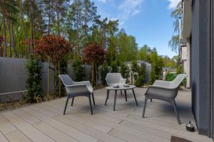 Zahrada ubytování Sunny Apartment Łukęcin by Noclegi Renters