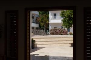a view through a window of a building at Costa Maya Bodrum in Bodrum City
