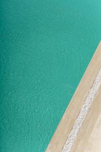 an image of a swimming pool with water at Costa Maya Bodrum in Bodrum City