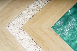 a close up of a floor with rocks on it at Costa Maya Bodrum in Bodrum City