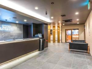 Lobbyn eller receptionsområdet på HOTEL LiVEMAX Okazaki