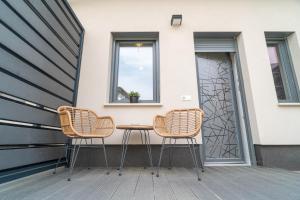 Balkón alebo terasa v ubytovaní La Vita Prémium Panzió