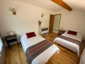 Posteľ alebo postele v izbe v ubytovaní Gîte le Moulin Samsara