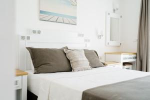 Postel nebo postele na pokoji v ubytování Costa Sariyaz Hotel Bodrum