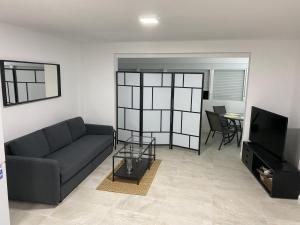 A television and/or entertainment centre at New Beachfront Loft