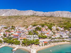 an aerial view of a town on a beach at New! Villa Bava with 4 En-suite Bedrooms, Heated 33 sqm Pool in Omiš