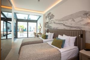 Кровать или кровати в номере Liberty Fabay - Ultra All Inclusive +37 фотографий