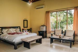 Ocean View Tulamben Dive & Resort客房内的一张或多张床位