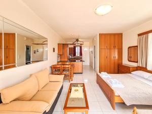 Posteľ alebo postele v izbe v ubytovaní Colonial Studio/Apartment