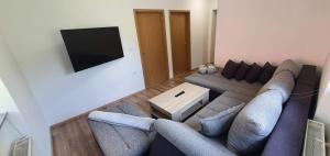 Zona d'estar a Apartment Podkuze