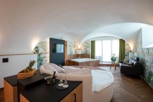 Krevet ili kreveti u jedinici u okviru objekta Romantik Hotel le Vignier