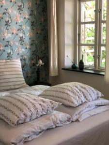 Cama ou camas em um quarto em Skelby Præstegaard