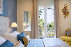 Llit o llits en una habitació de Hotel Rivage Taormina