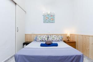 Postel nebo postele na pokoji v ubytování YourHouse Petita, beach house in Majorca North + 37 fotografií