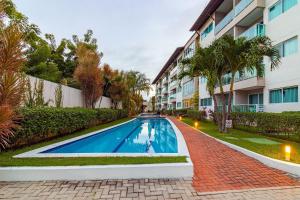 A piscina localizada em Porto Plaza #402 - Flat espaçoso por Carpediem ou nos arredores