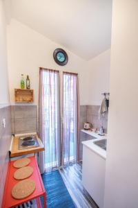 Kuchyň nebo kuchyňský kout v ubytování MAISON44