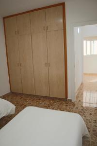 Postel nebo postele na pokoji v ubytování JUST To SLEEP 2 BEDROOMS APARTMENTS