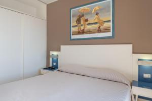Postel nebo postele na pokoji v ubytování Hotel Mareluna
