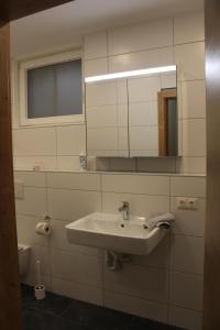 Kúpeľňa v ubytovaní Haus Jochler + 17 fotografií