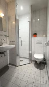 Ванная комната в Hotel Rozenburg