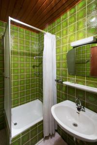 Phòng tắm tại Ferienwohnungen Casa Ri(e)sig