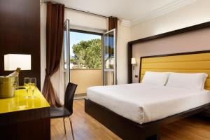 Postel nebo postele na pokoji v ubytování Park Hotel Marinetta - Beach & Spa