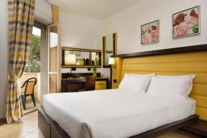 Postel nebo postele na pokoji v ubytování Park Hotel Marinetta - Beach & Spa
