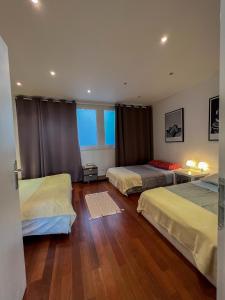Säng eller sängar i ett rum på Le Central Victoria III - Central Point - 105m2