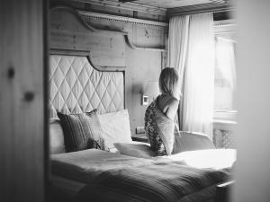 Posteľ alebo postele v izbe v ubytovaní Burg Hotel Oberlech