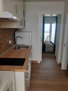 A kitchen or kitchenette at Las vistas