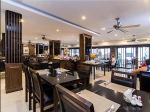 En restaurant eller et spisested på Honey Inn Pattaya