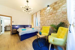 Postel nebo postele na pokoji v ubytování Apartman Kolura Vis