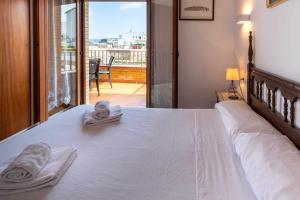 Posteľ alebo postele v izbe v ubytovaní Sant Carles 20 Apartamento con vistas al mar