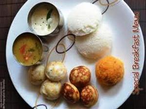 a plate with different types of mushrooms on it at Hotel Shiv Sangram in Ahmadnagar