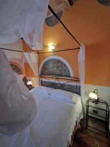 Postel nebo postele na pokoji v ubytování Saturnia Residence