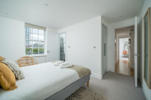Voodi või voodid majutusasutuse ALTIDO Spectacular 3-bed flat near Holland Park toas