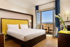 Postel nebo postele na pokoji v ubytování Park Hotel Marinetta - Beach & Spa