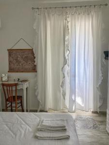 Postel nebo postele na pokoji v ubytování Villa Volli Three Rooms