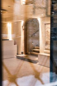 a view of a room with stairs in a building at Hotel Dei Dragomanni in Venice