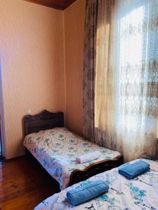 Voodi või voodid majutusasutuse Guesthouse Kamelia toas
