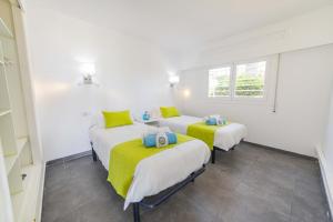Posteľ alebo postele v izbe v ubytovaní Apartamento Beachfront Sonrisas