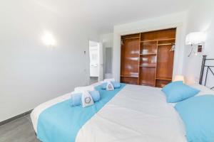 Posteľ alebo postele v izbe v ubytovaní Apartamento Beachfront Sonrisas